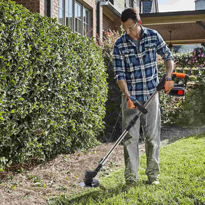 Débroussailleuse noire fiable pour entretenir les zones difficiles et les grands espaces